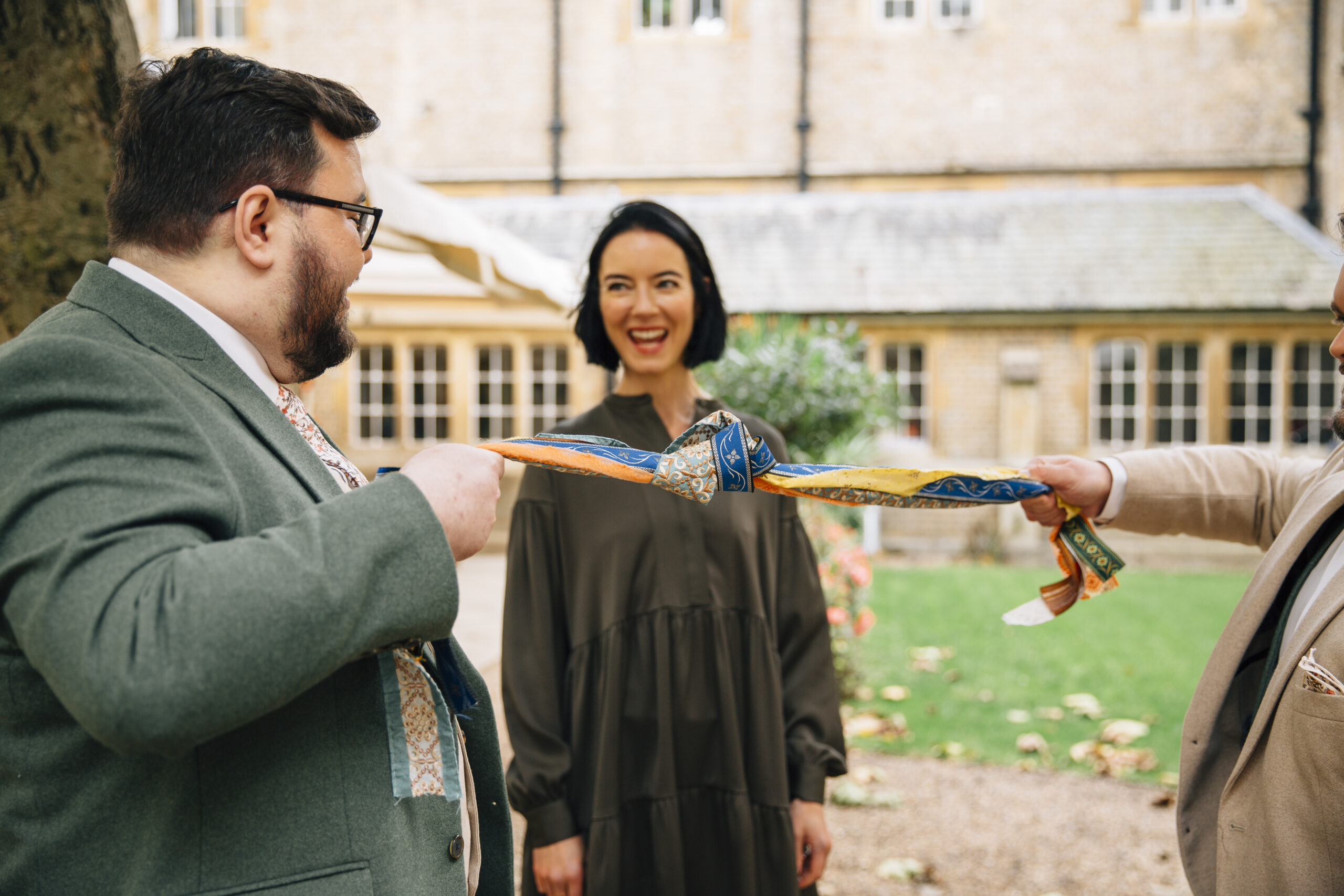 A joyful, authentic autumn wedding at Le Gothique in South London, part of the Royal Victoria Patriotic Building in Wandsworth. This celebration between two grooms was filled with warmth, laughter, and genuine emotion. Photographed in a natural, documentary style by Paola De Paola, a London-based wedding photographer who celebrates LGBTQ+ love, diversity, and real connection.